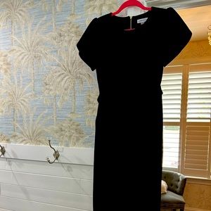 Stunner! Calvin Klein jumpsuit. Jet black color with tie at waist.